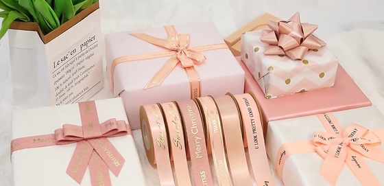 কেনা কাস্টম মুদ্রিত লোগো এবং গোলাপী স্বর্ণের ফয়েল সহ উচ্চ দৃঢ়তা উপহার মোড়ক স্যাটিন রিবন online manufacture