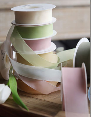 ভালো দাম 4 সেন্টিমিটার কঠিন রঙের জেলি তুষার গাজ ফুলের তোড়া প্যাকেজিং রিবন ফুলের প্যাকেজিং ফুলের উপকরণ উপহার কেক প্যাকেজিং রিবন অনলাইন