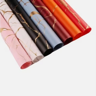 ভালো দাম পাইকারি গোল্ড মার্বেল ফুলের প্যাকেজিং কাগজ জলরোধী ফুলের উপকরণ উপহার প্যাকেজিং অনলাইন