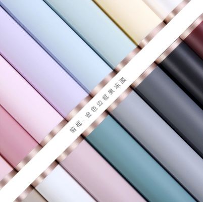 ভালো দাম প্লাস্টিক কোরিয়ান-স্টাইল সোনালী-প্রান্তযুক্ত জেলি ফিল্ম পেপার ফুলের সেলফোন আধা-স্বচ্ছ ফুলওয়ালা মোড়ানো তোড়া ধুলো-প্রতিরোধী কাগজ অনলাইন